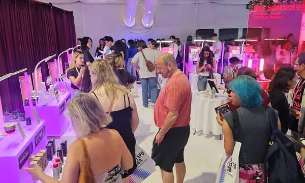 Visitors browsing K-Beauty product displays at the All That Glow zone